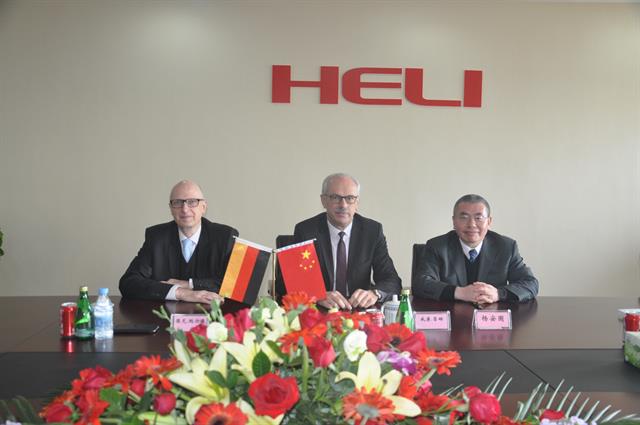 Dirk Bald and Wilhelm Rehm (ZF) with Anguo Yang (Anhui Forklift Group)
