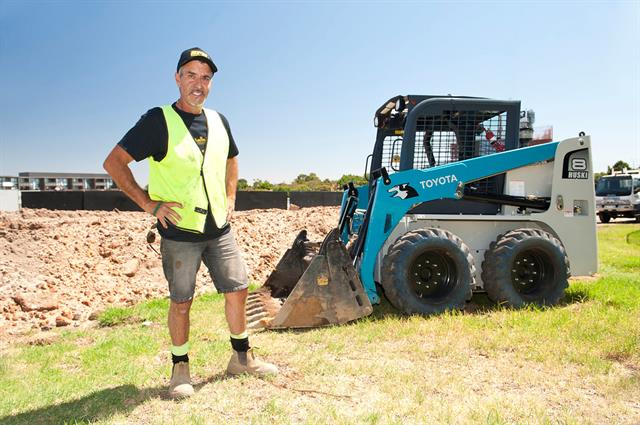 Frank Blasi with his Toyota Huski 5SDK-8 skid-steer loader.
