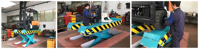 Heavy-duty lift table for forklift trucks maintenance.