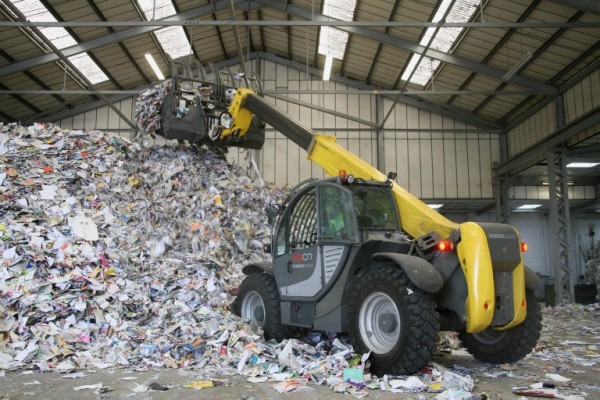 Kramer's 4507 telehandler can place and push waste paper into tall stockpiles.