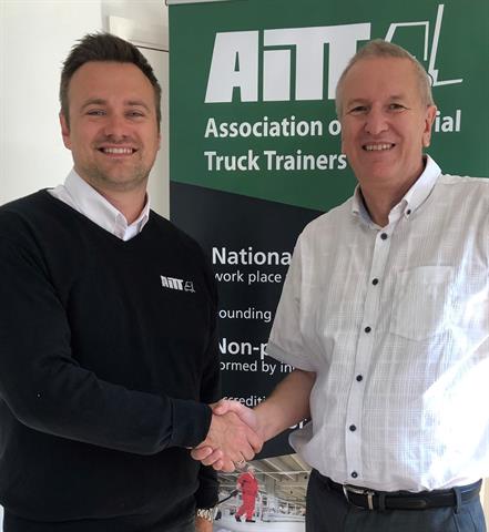 Adam Smith and Tim Waples mark their associations' alliance
