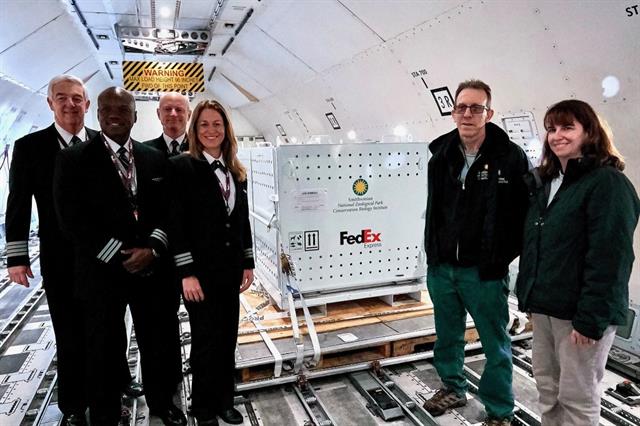 FedEx and zoo officials prepare for their special delivery