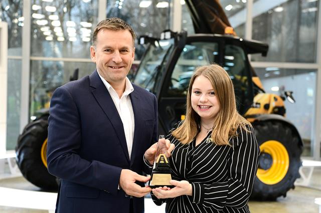 JCB CEO Graeme Macdonald congratulates Louise Meredith on being named as Higher or Degree Apprentice of the Year.