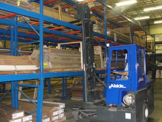 Maximizing Floor Space no problem with Combilift USA and KOOI Reachforks<sup>®</sup>