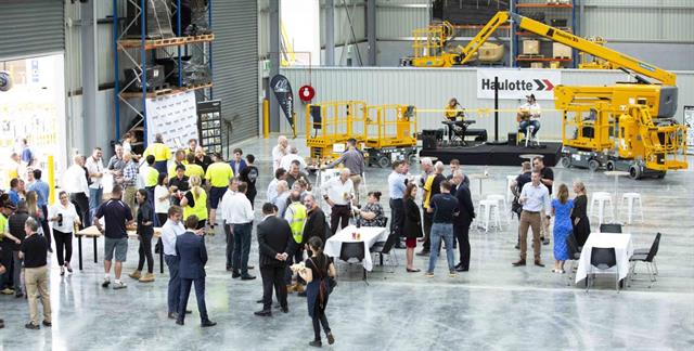 Haulotte staff and guests celebrate the opening