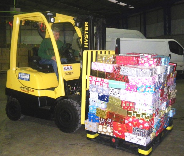 The Barloworld Handling-supplied Hyster forklift carrying shoeboxes of gifts for Samaritan Purse's Operation Christmas Child campaign.