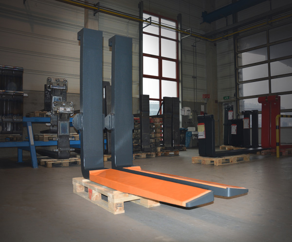 BigForks for coil-transport with spray-coating.