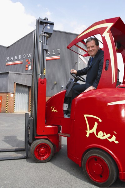 John Maguire in a Flexi articulated forklift.