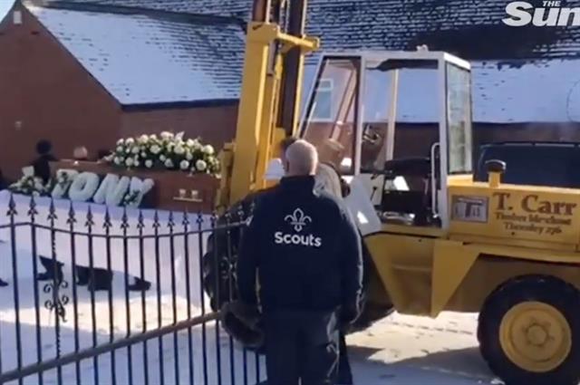 Tony Carr's forklift carries his coffin. PHOTO: NORTHERN ECHO