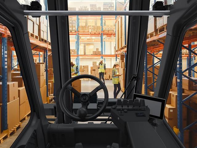 The view from a traditional forklift features the mast placed in front of the cab, reducing the visibility.