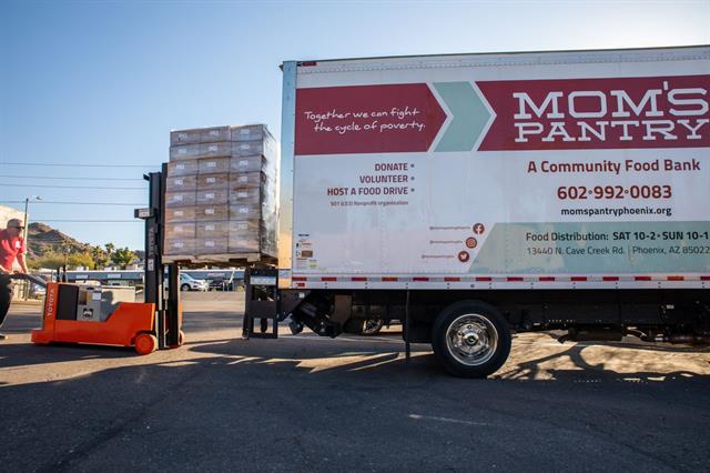 TMH's donation will assist the Mom's Pantry food bank