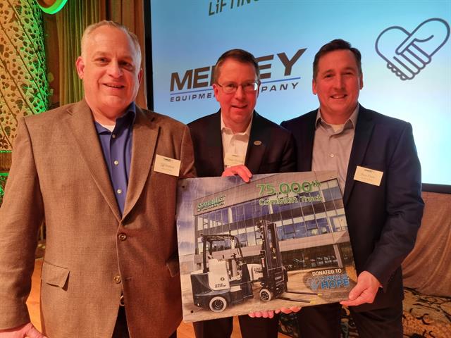 Jeff Smethers (Convoy of Hope), Martin McVicar (Combilift) and Erick Meier (Convoy of Hope)