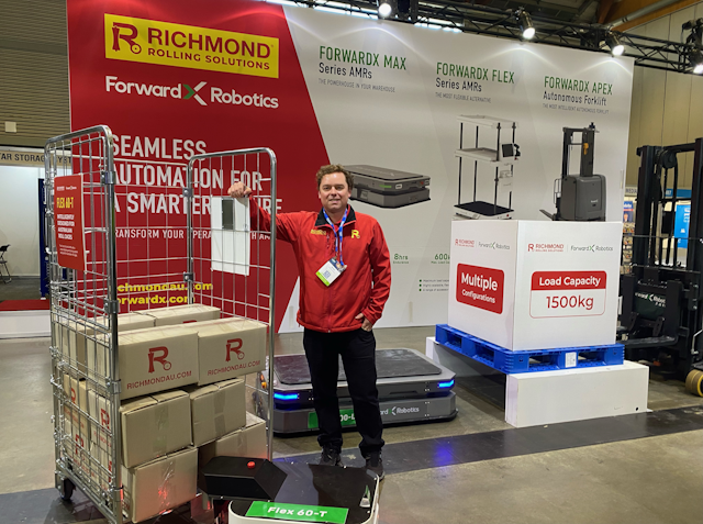 Richmond Rolling Solutions CEO Breton Winslow-Moore with the new line of ForwardX robots from China.