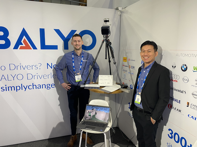 Joshua Couturier and Jian Han Law at the Balyo booth