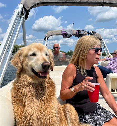 Liz and her puppy Chester enjoying some downtime on the boat