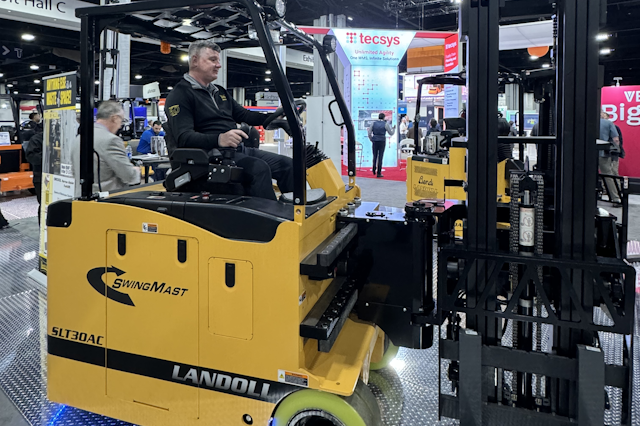 Landoll's Al Connelly  expertly showing off their swing mast