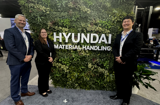 Jason Taylor, Bernadette McLintock and Han Vit Kim of Hyundai are waiting to talk to the first wave of visitors at Modex 2024.