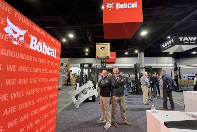 Now these guys know how to pose for a photo. Standing proud, Mark and Conner at the Bobcat exhibit on day three.