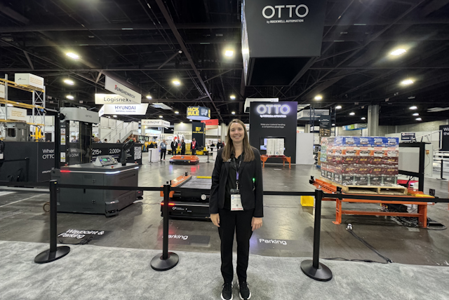 Over at the OTTO booth Jess invites visitors to take a seat in their seating area to witness their AMRs in action.