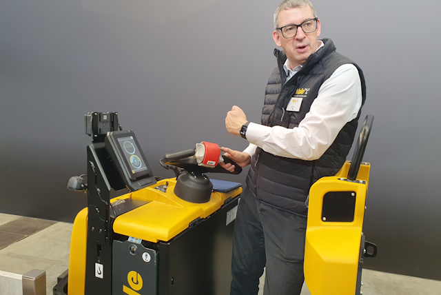 Yale director of warehouse sales Ron Farr demonstrates the Yale Reliant system