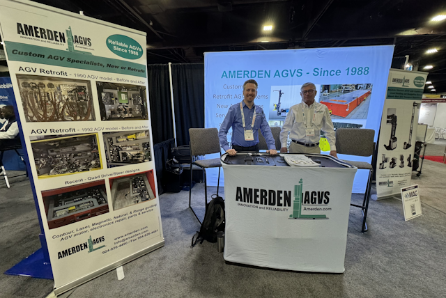 AGV Systems experts Jonas and David from Amerden AGVs take a minute to pose for a team photo.