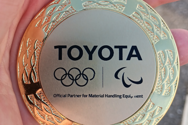 Toyota promotes its materials handling partner status for this year's Olympics at logimat.