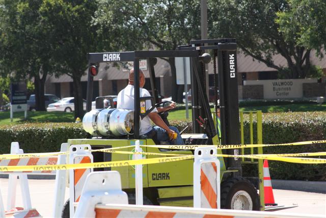 Equipment operator Rome Hernandez of the Carrollton streets and <br />drainage department competes in the forklift rodeo.