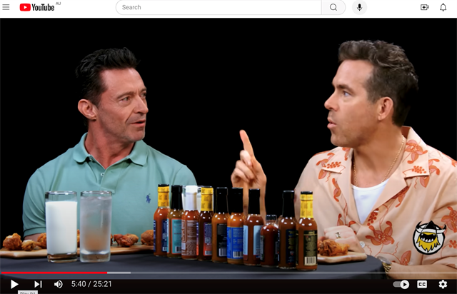 Movie stars Hugh Jackman and Ryan Reynolds discuss forklifts on Hot Ones