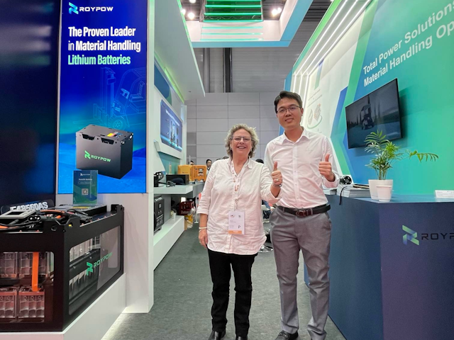 Forkliftaction's Angie Kay and RoyPow sales manager Jason Liu give LogiMAT the thumbs up on DAY 1.
