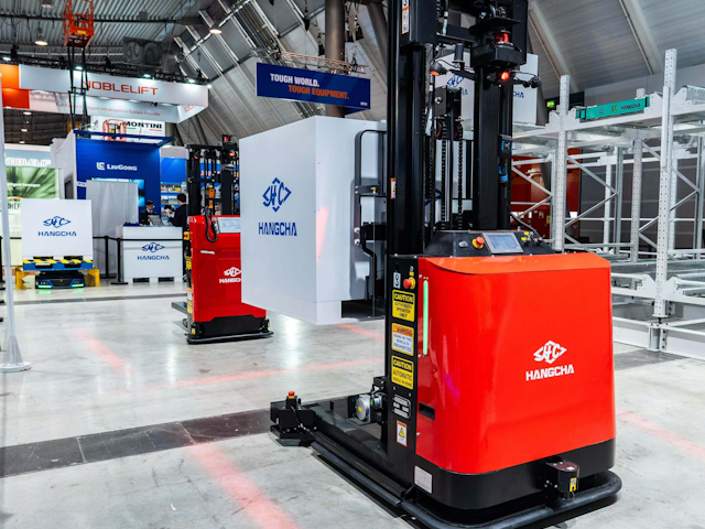 Two automated forklifts pirouette around each other as part of Hangcha's live demonstration of their latest automated solutions.