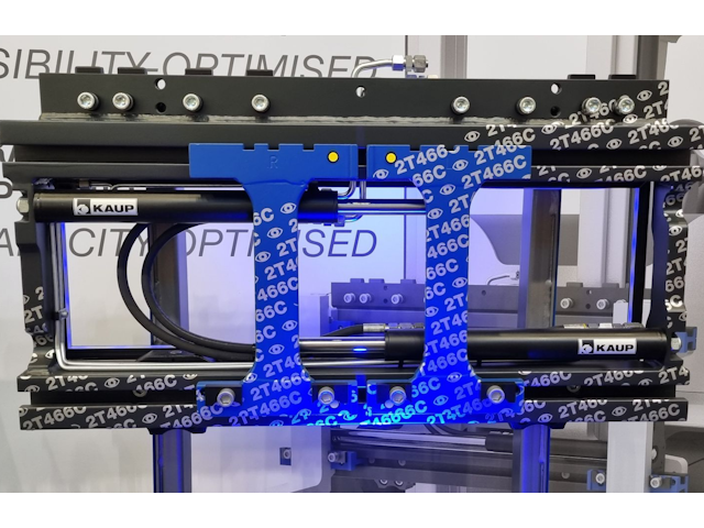 KAUP proudly displays their Fork Positioner T466C, which is making its debut at the show.