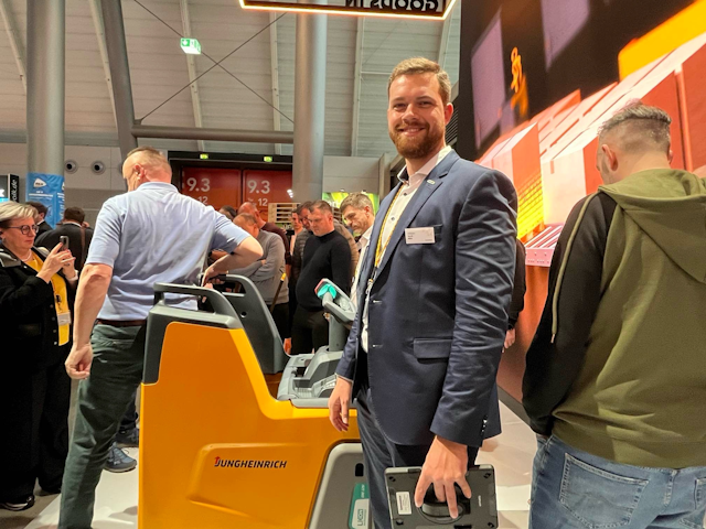 Jungheinrich junior sales manager Adrian Bock takes a minute out at the busy stand to pose for a photo.