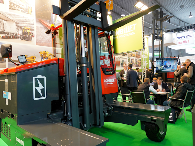 Standing proud at the Combilift stand their electric C5000E multi directional forklift.
