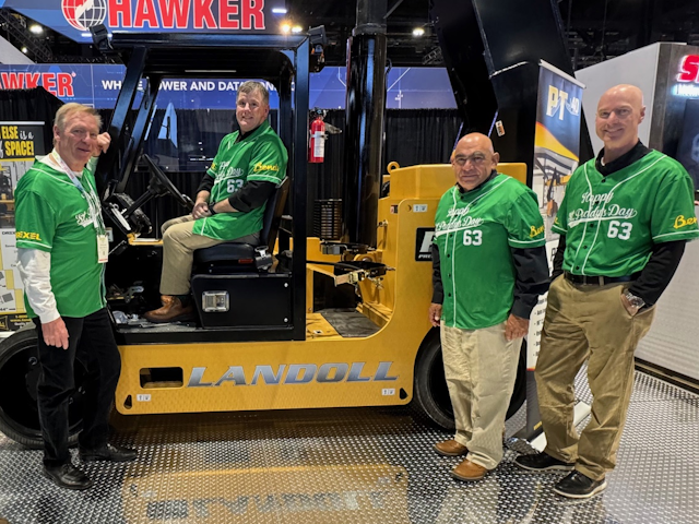 The Landoll team proudly show off the Landoll PT40 precision telehandler.