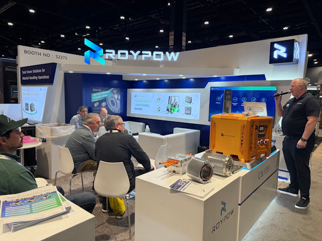 At the ROYPOW stand, director of energy storage Chris Miltimore takes visitors through the company's complete power solutions for material handling operations.