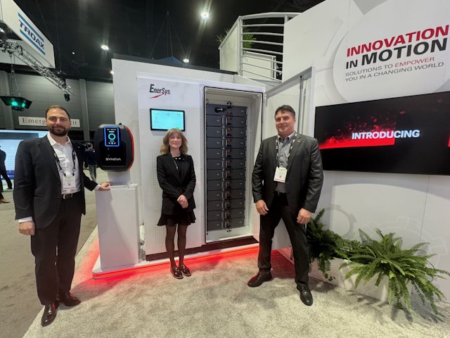 The Enersys team Chris, Katya and Mattia, proudly show off their NexSys™ Battery Energy Storage System and Synova™ Advanced Charger on DAY 3.