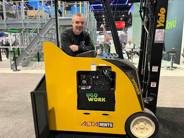 UgoWork's Jean-Francois Marchand looking relaxed and ready for a chat while leaning on a forklift fitted with one of their lithium-ion batteries.