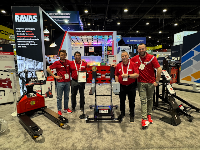 Taken on DAY 4, a fantastic team photo of RAVAS, standing proudly amidst their cutting-edge mobile weighing solutions.