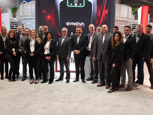 Now that's a team photo. Enersys sizable team at ProMat smiles for the camera.