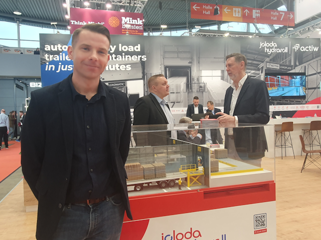 Joloda Hydraroll's Gary Warner shows off a model of one of their automated loading systems.