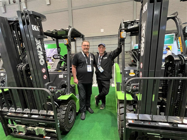 Greg Meyer and Matt Gye from XCMG take five for a happy snap between two of their offerings