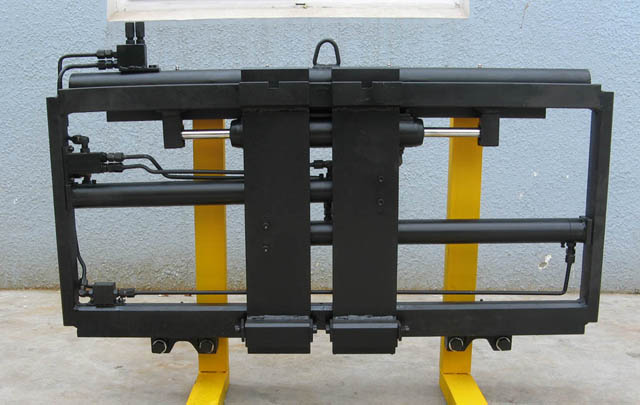 If a fork positioner costs the same as a sideshifter, would you still want to move the forks manually?
