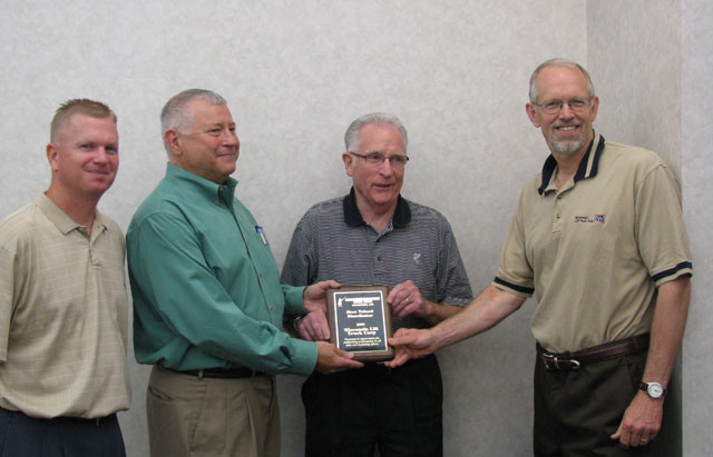 (L-R) Curt Larson, Steel King sales manager; Lawrence Eastman, Steel King VP of sales; Otto Wolter, Wisconsin Lift Truck COO; and Jerry Weidmann, Wisconsin Lift Truck president
