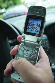Operating a forklift while using a cell phone