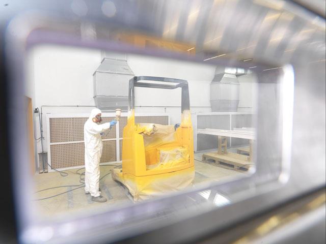 The forklift is painted in