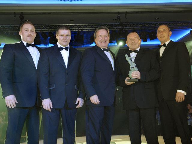 John Maguire of award sponsor Narrow Aisle Flexi (centre) presented the inaugural FLTA Safe Site Award to (L to R) Gary Wood, Andrew Ashcroft, Kevin Stilling and Shaun Humphreys of Sellafield Ltd.