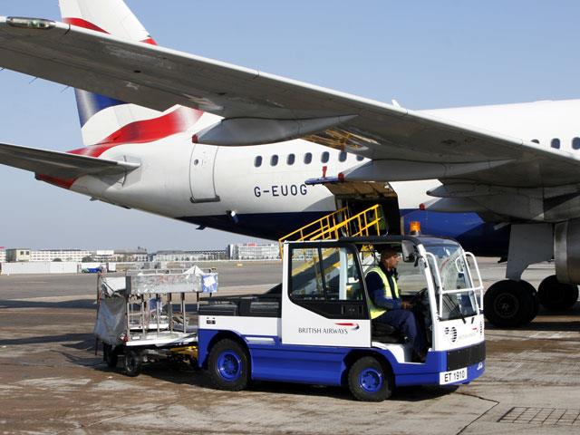 Linde electric tow tractors working at London's Heathrow Airport