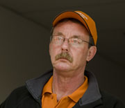 Richard Aldersley, regional manager of the Ritchie Bros Los Angeles facility, works as the auctioneer's clerk during a recent auction in Los Angeles.