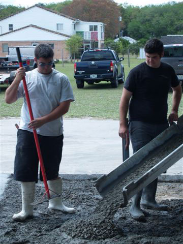 The Donaldson brothers working on a concrete construction project.