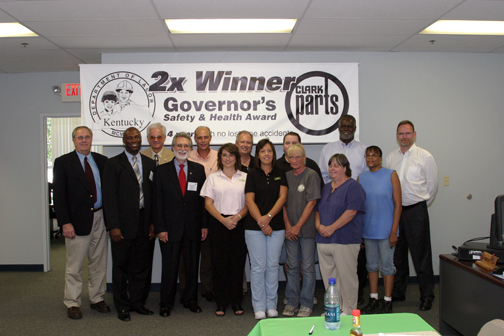 Kentucky department of labour commissioner Phillip Anderson presents the award to Clark's safety committee and managers.
